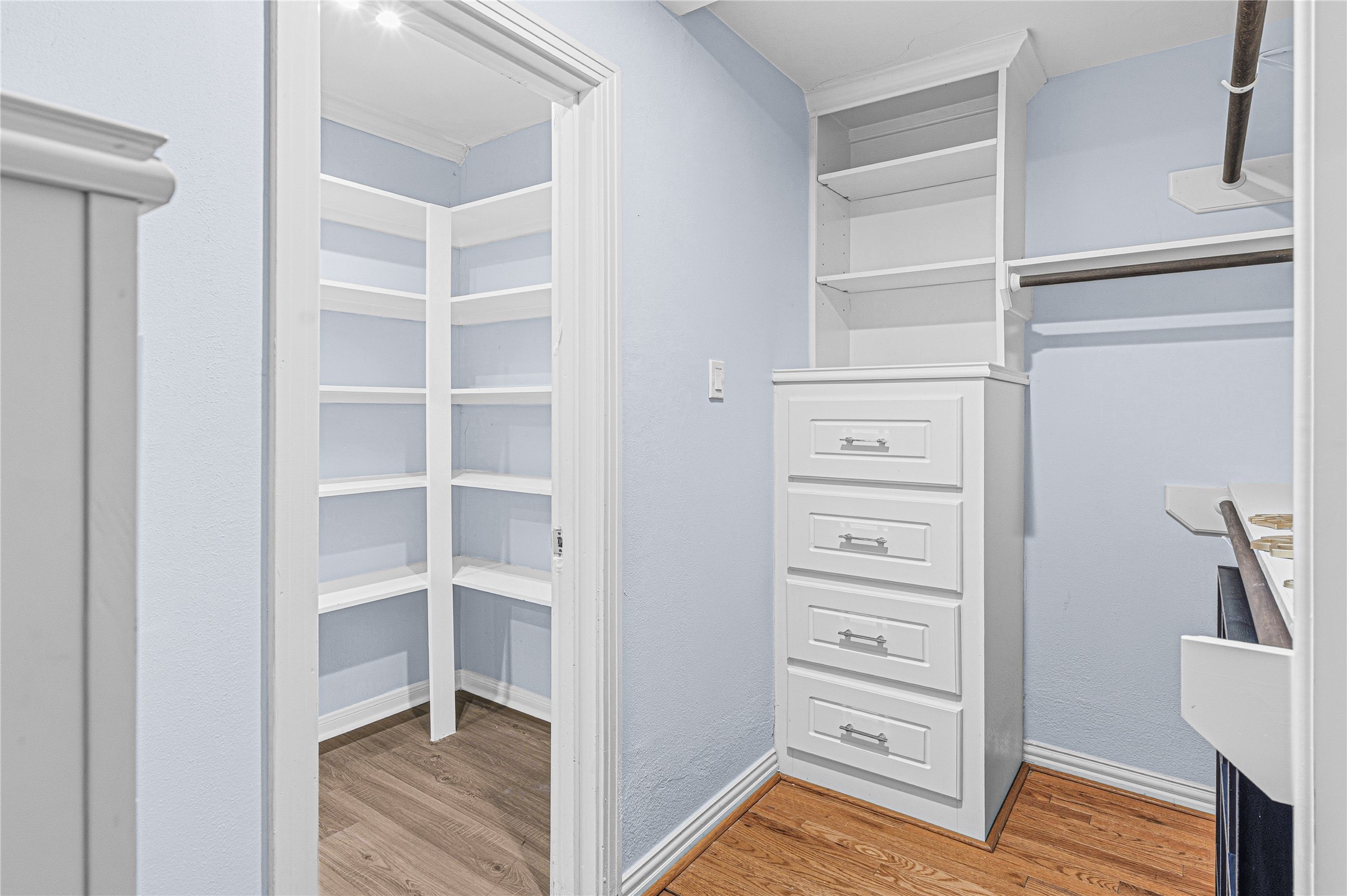 4002 Merrick Street Houston, TX 77025 - Photo 19 of 22 a view of walk in closet with empty racks