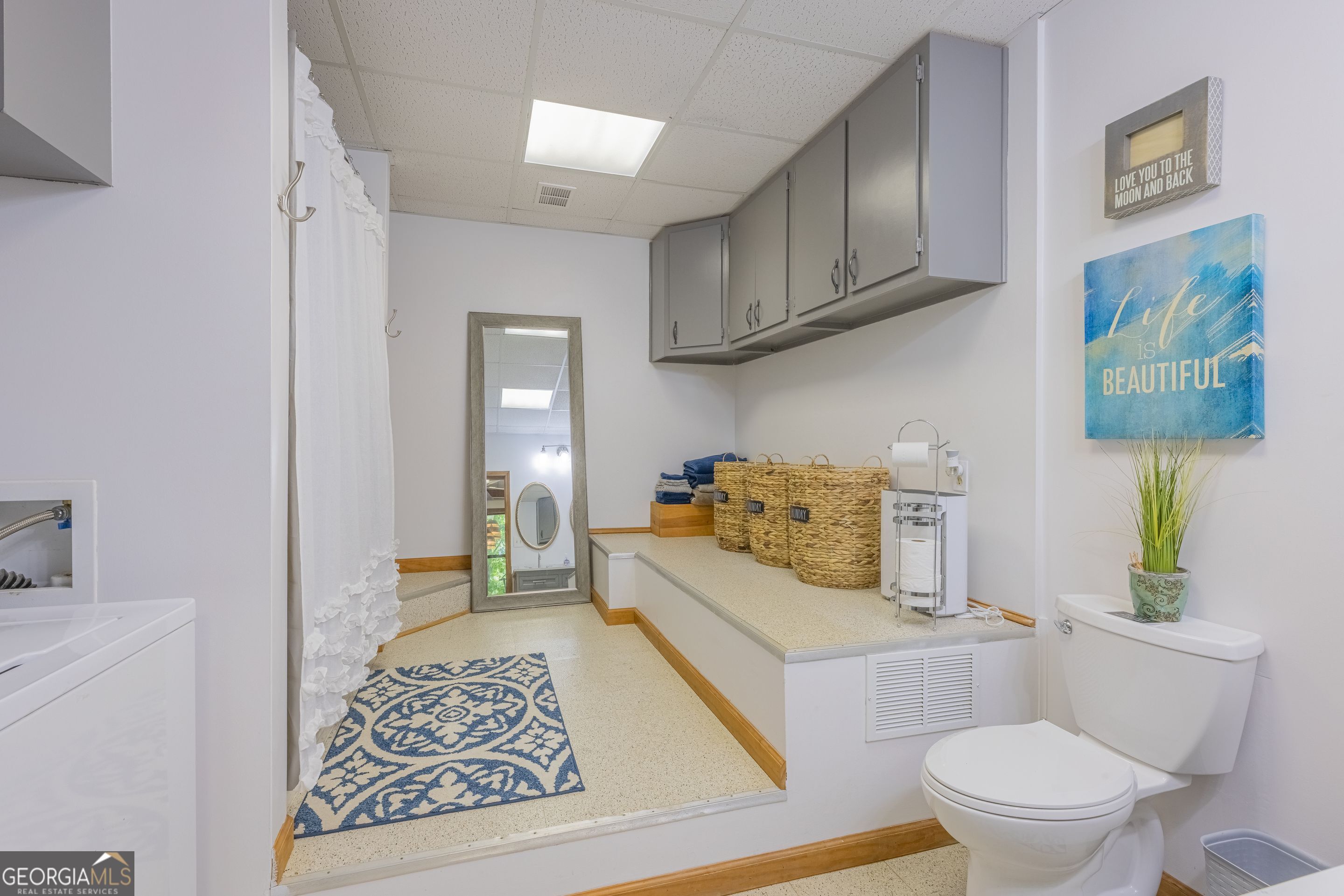 78 River Ridge Road, Unit 29 Martin, GA 30557 - Photo 16 of 21 a bathroom with a sink a toilet and a mirror