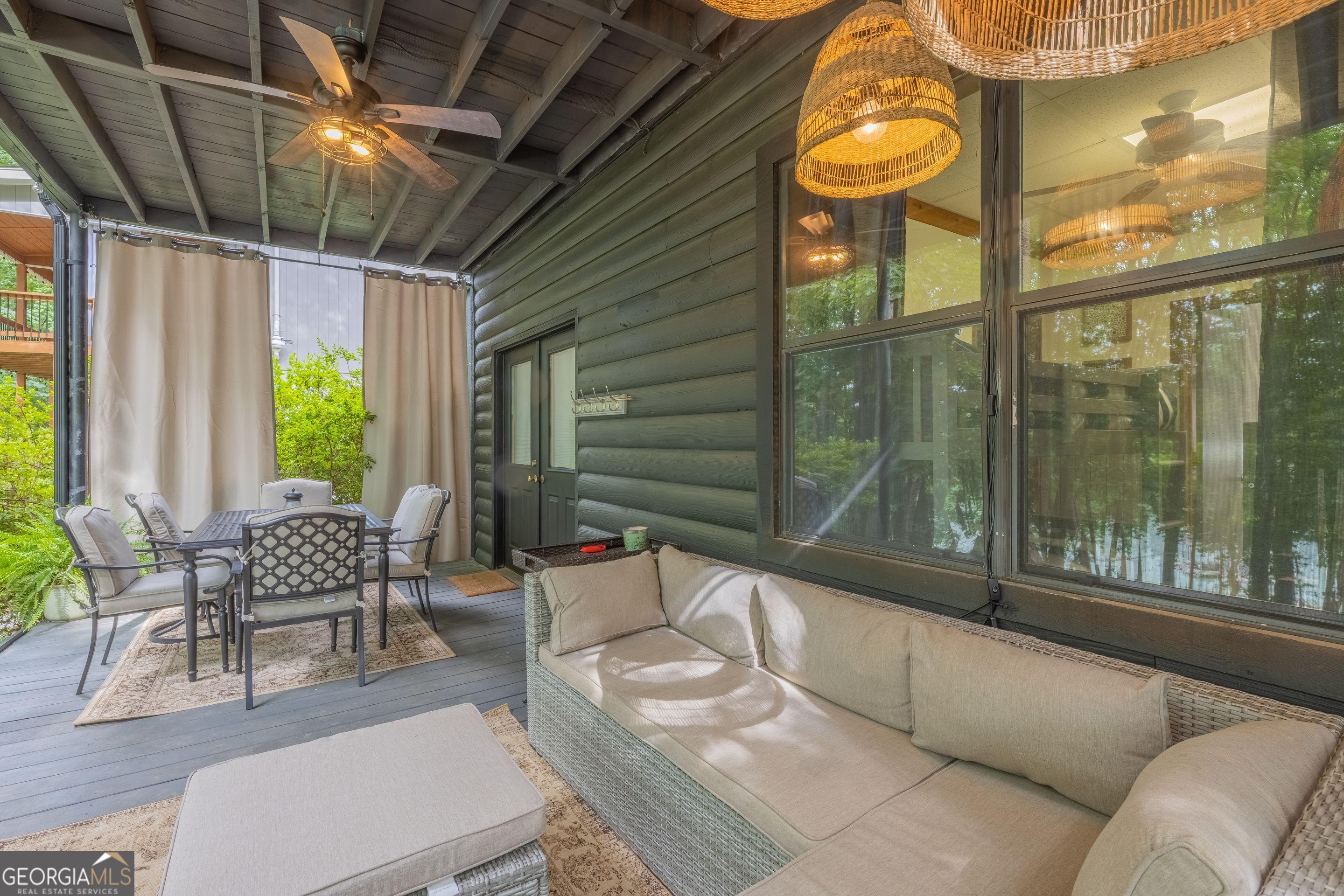 78 River Ridge Road, Unit 29 Martin, GA 30557 - Photo 18 of 21 a balcony with furniture and a large window