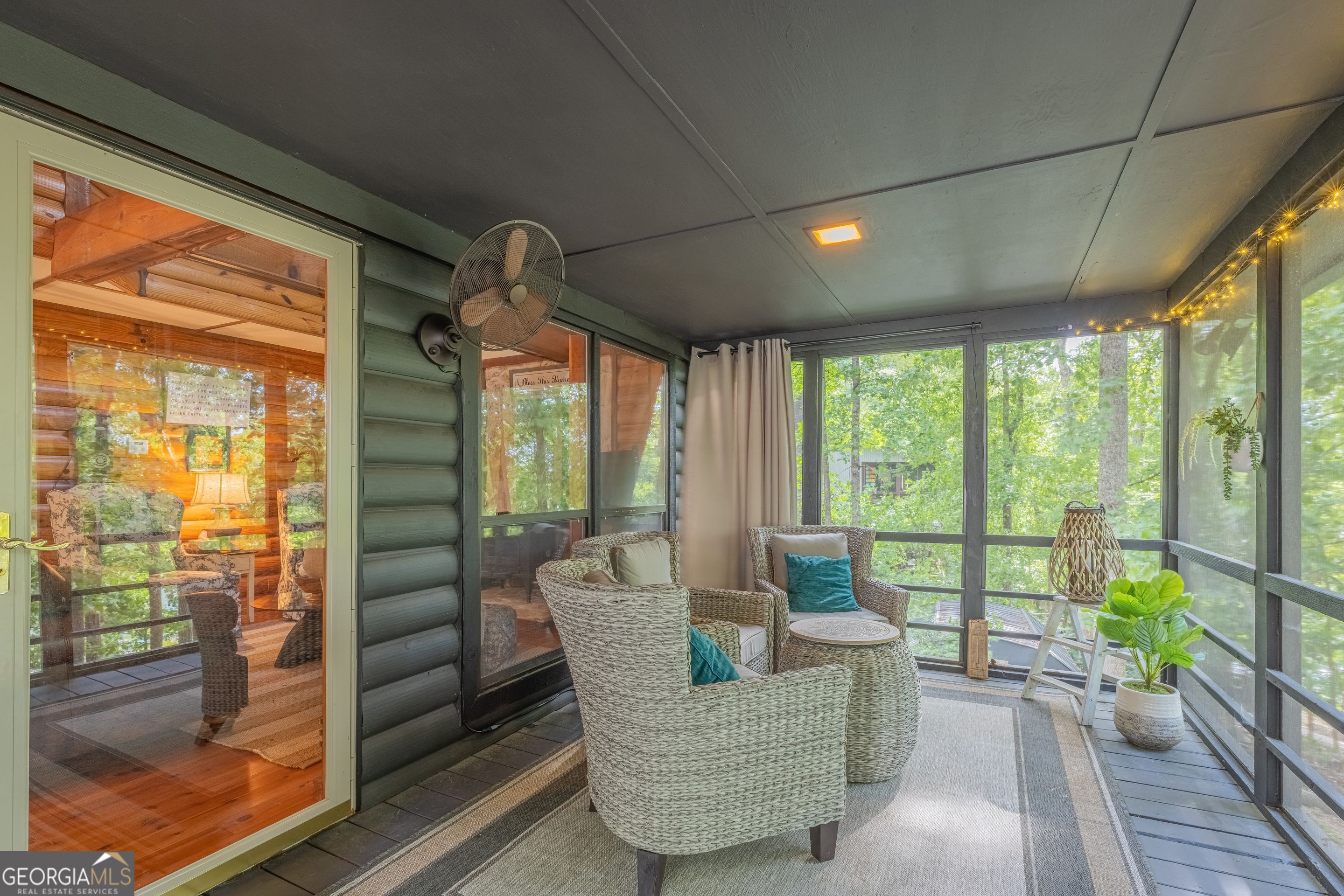 78 River Ridge Road, Unit 29 Martin, GA 30557 - Photo 20 of 21 a living room with furniture and a floor to ceiling window