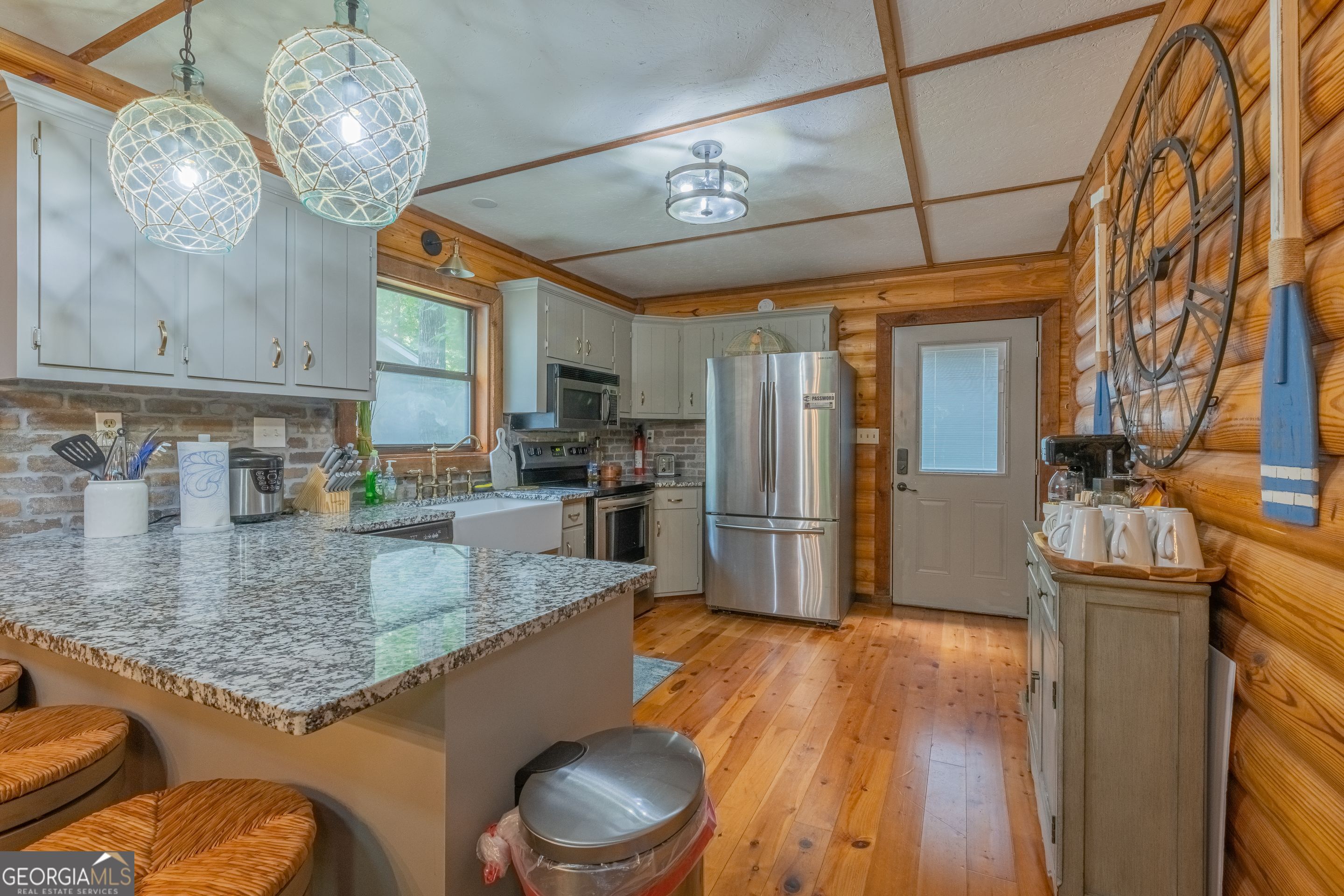 78 River Ridge Road, Unit 29 Martin, GA 30557 - Photo 7 of 21 a kitchen with stainless steel appliances granite countertop a sink a refrigerator and a stove