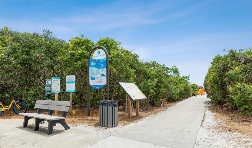 37 South Orange Street Inlet Beach, FL 32461 - Photo 7 of 22 a view of a chairs and table in a backyard