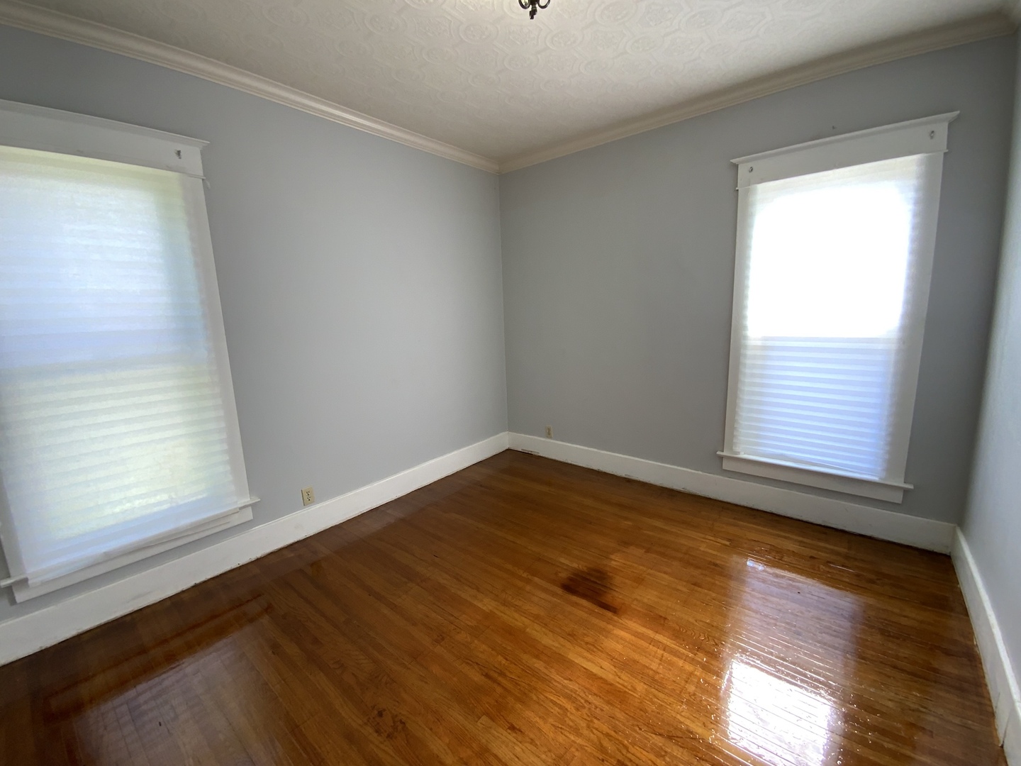 123 North Gilbert Street Danville, IL 61832 - Photo 8 of 8 wooden floor in an empty room with a window