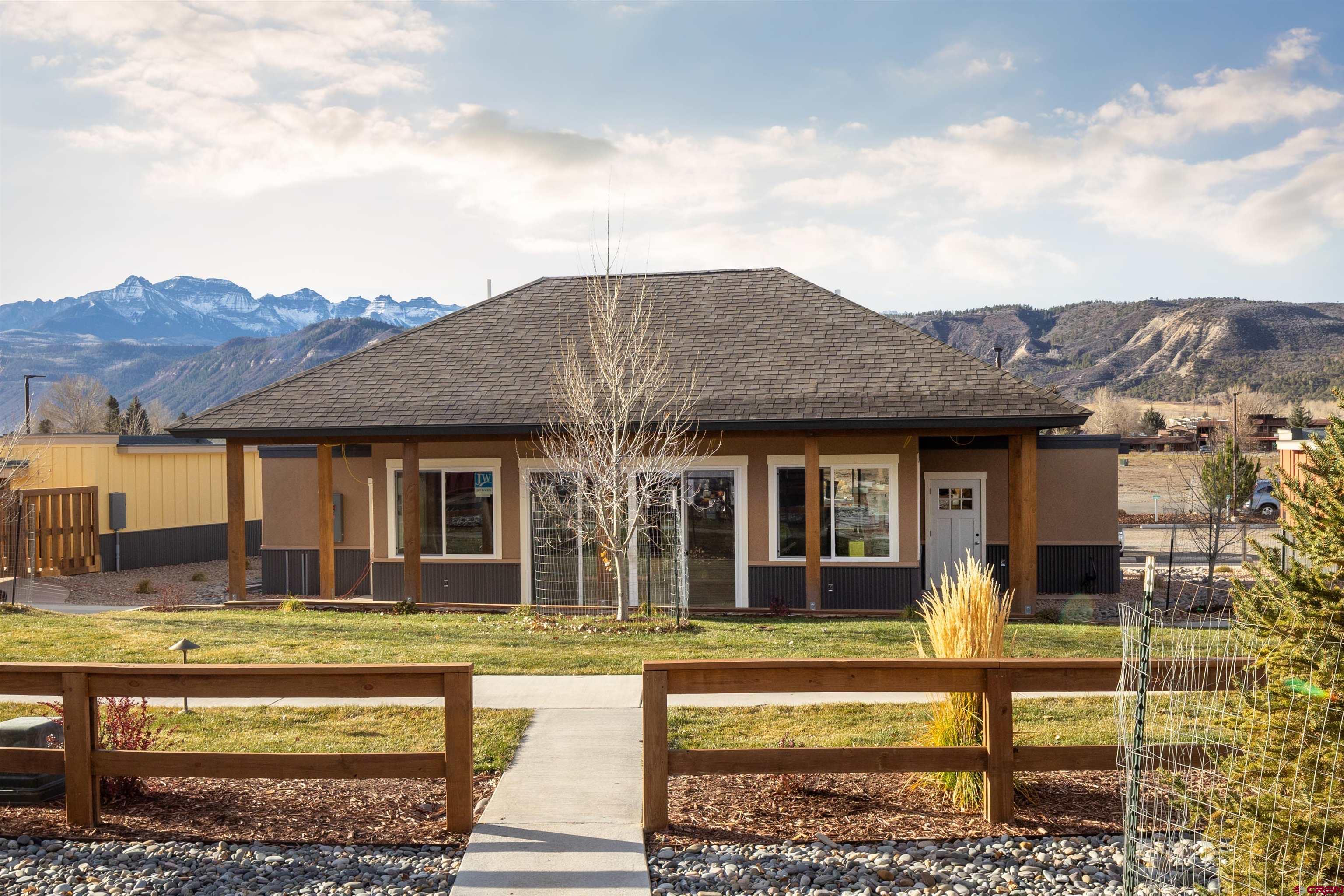 228 Redcliff Drive Ridgway, CO 81432 - Photo 14 of 35 a view of a house with a big yard plants and large tree
