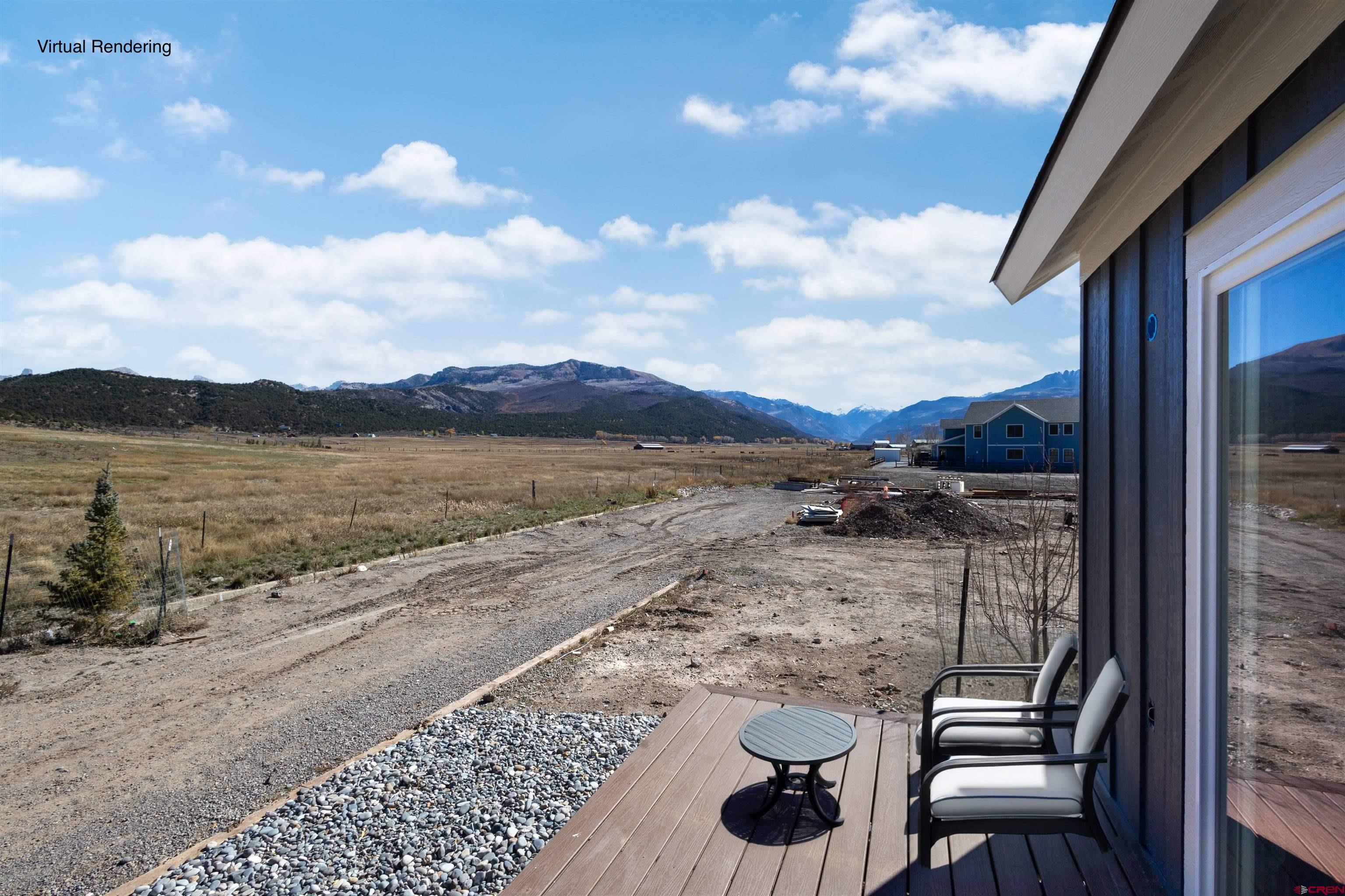 228 Redcliff Drive Ridgway, CO 81432 - Photo 16 of 35 a view of a terrace with wooden floor and lake view