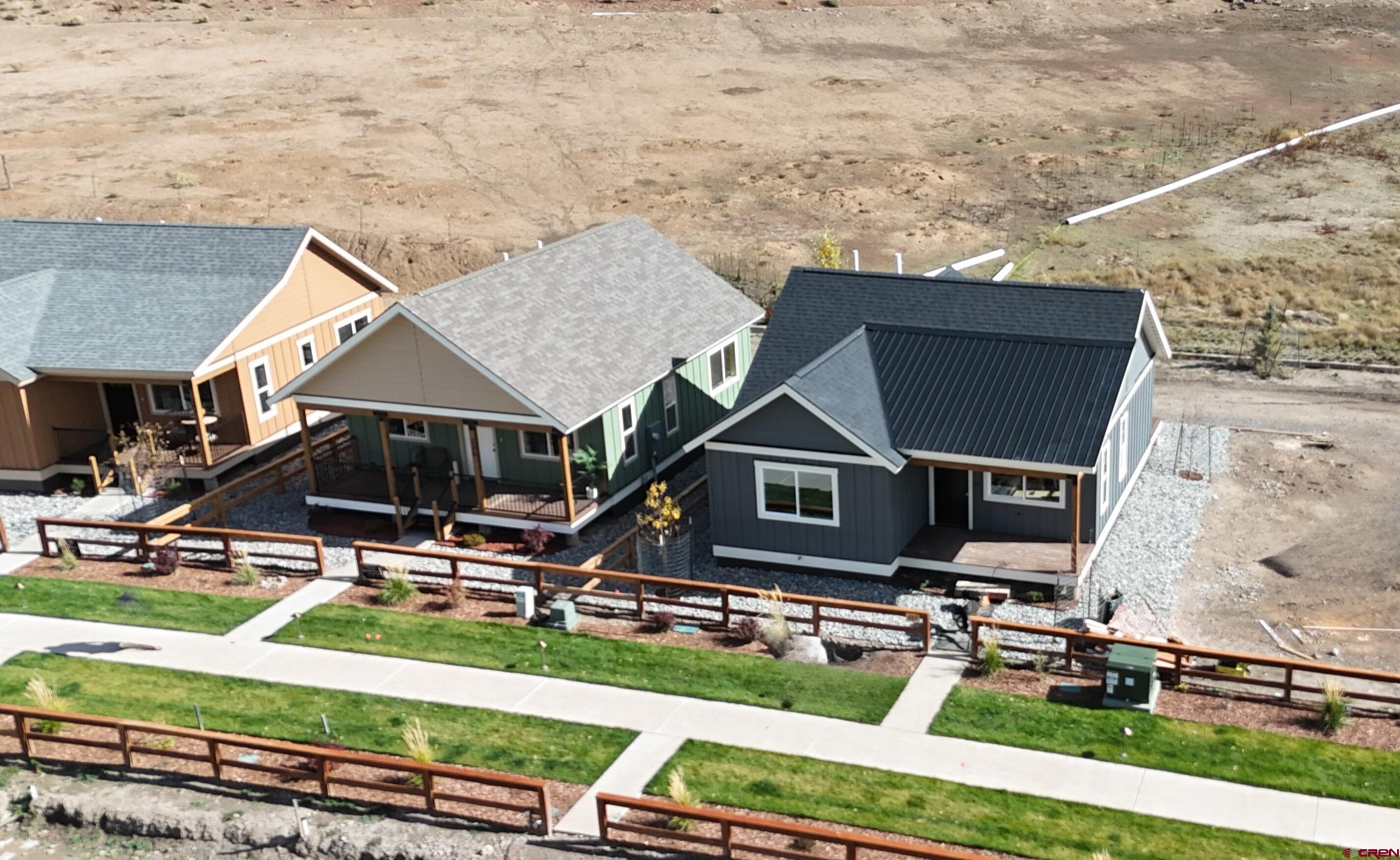 228 Redcliff Drive Ridgway, CO 81432 - Photo 23 of 35 a front view of a house with garden