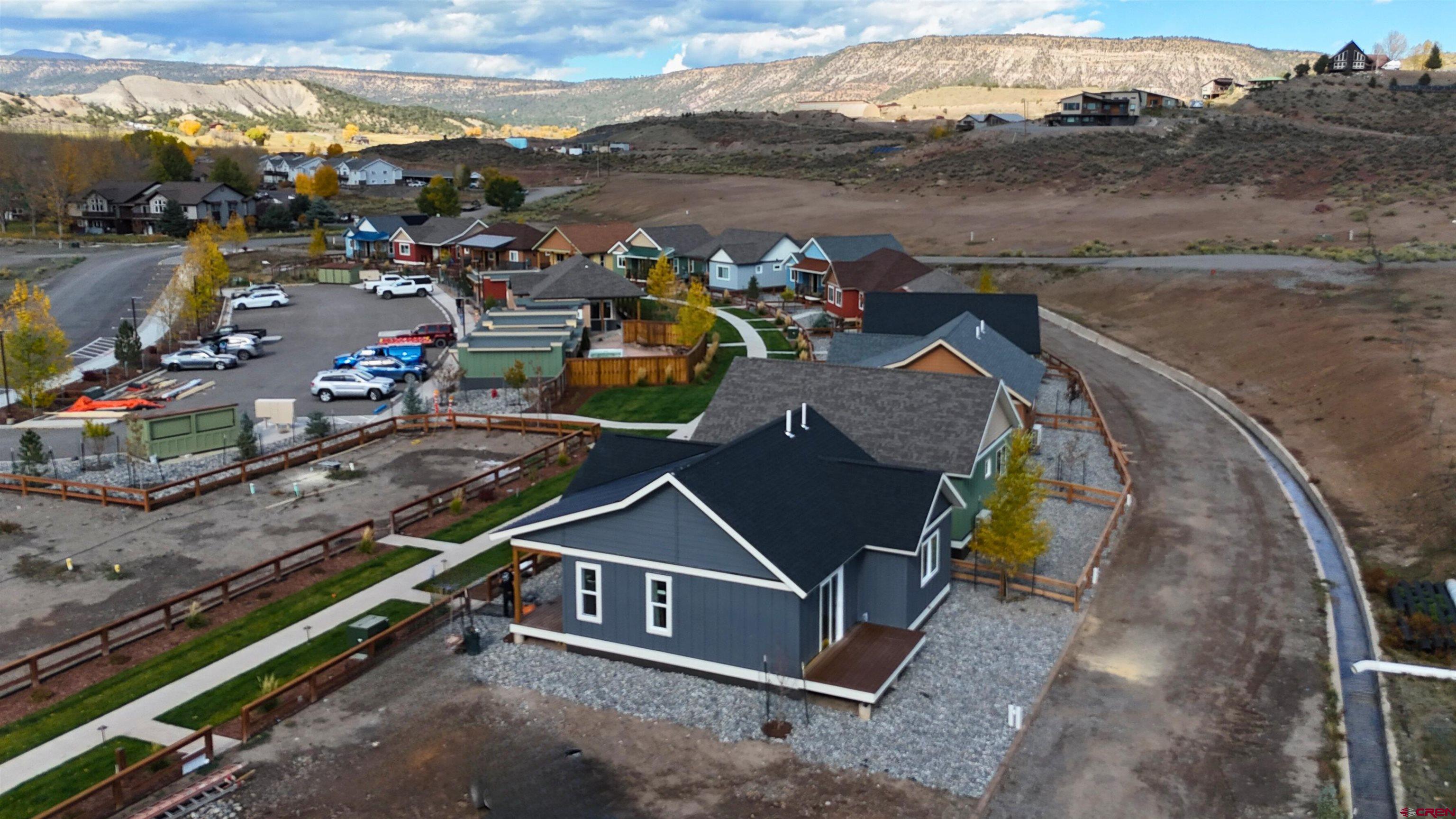 228 Redcliff Drive Ridgway, CO 81432 - Photo 25 of 35 an aerial view of a yard with horses