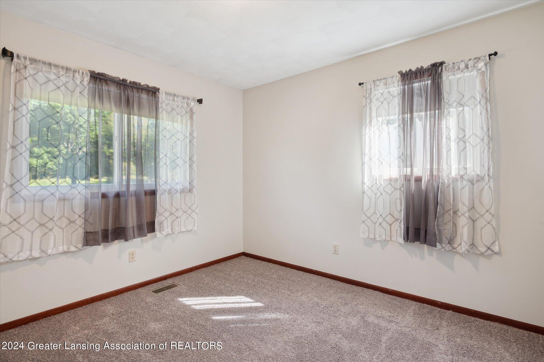 1009 West Barnes Road Mason, MI 48854 - Photo 29 of 65 24-1009-W-Barnes-Rd-Mason-MI-48854-Windo