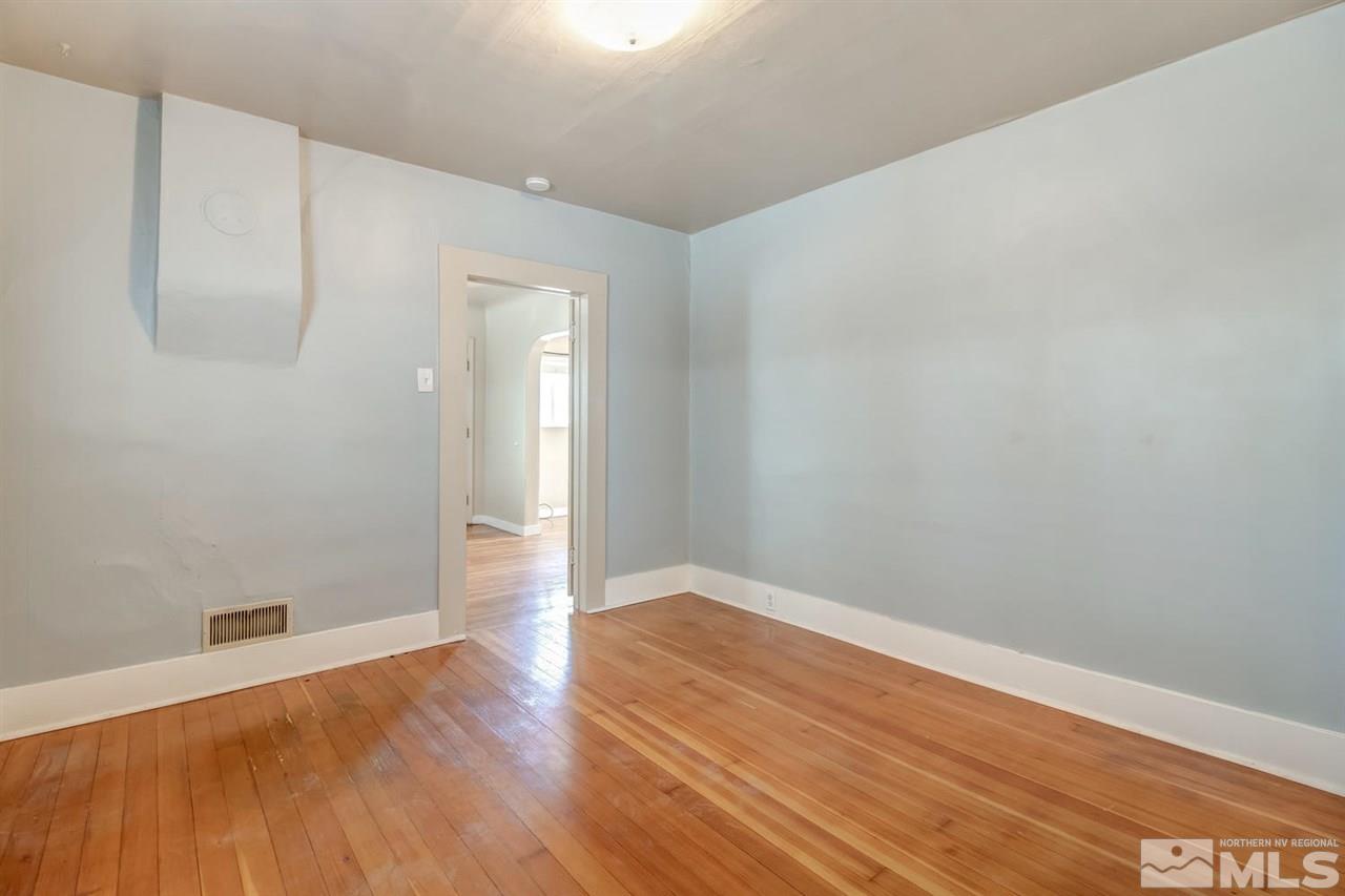 735 Plumas Street Reno, NV 89509 - Photo 20 of 25 a view of an empty room with wooden floor