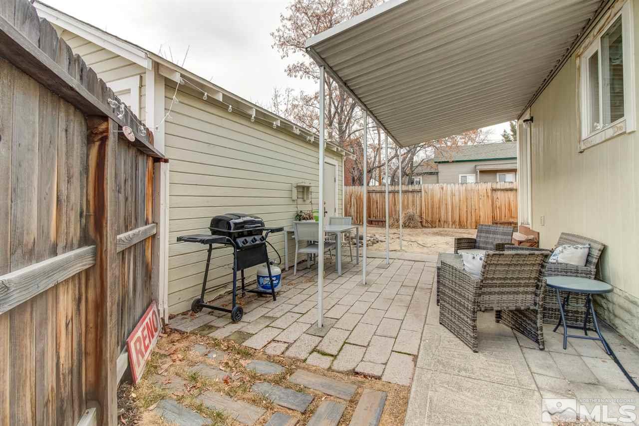 735 Plumas Street Reno, NV 89509 - Photo 23 of 25 a view of a patio with a table and chairs and a barbeque