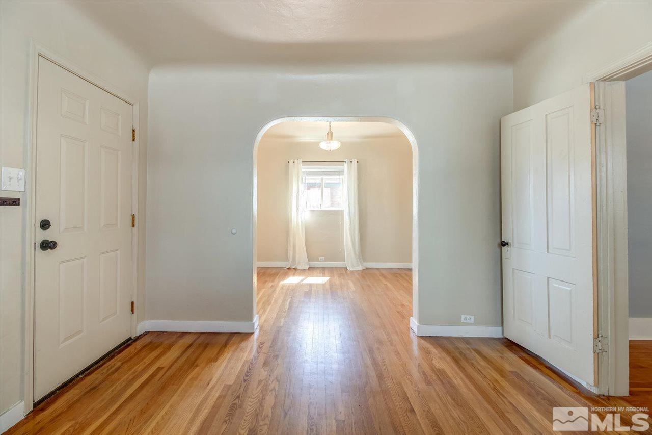 735 Plumas Street Reno, NV 89509 - Photo 6 of 25 a view of a room with wooden floor and window