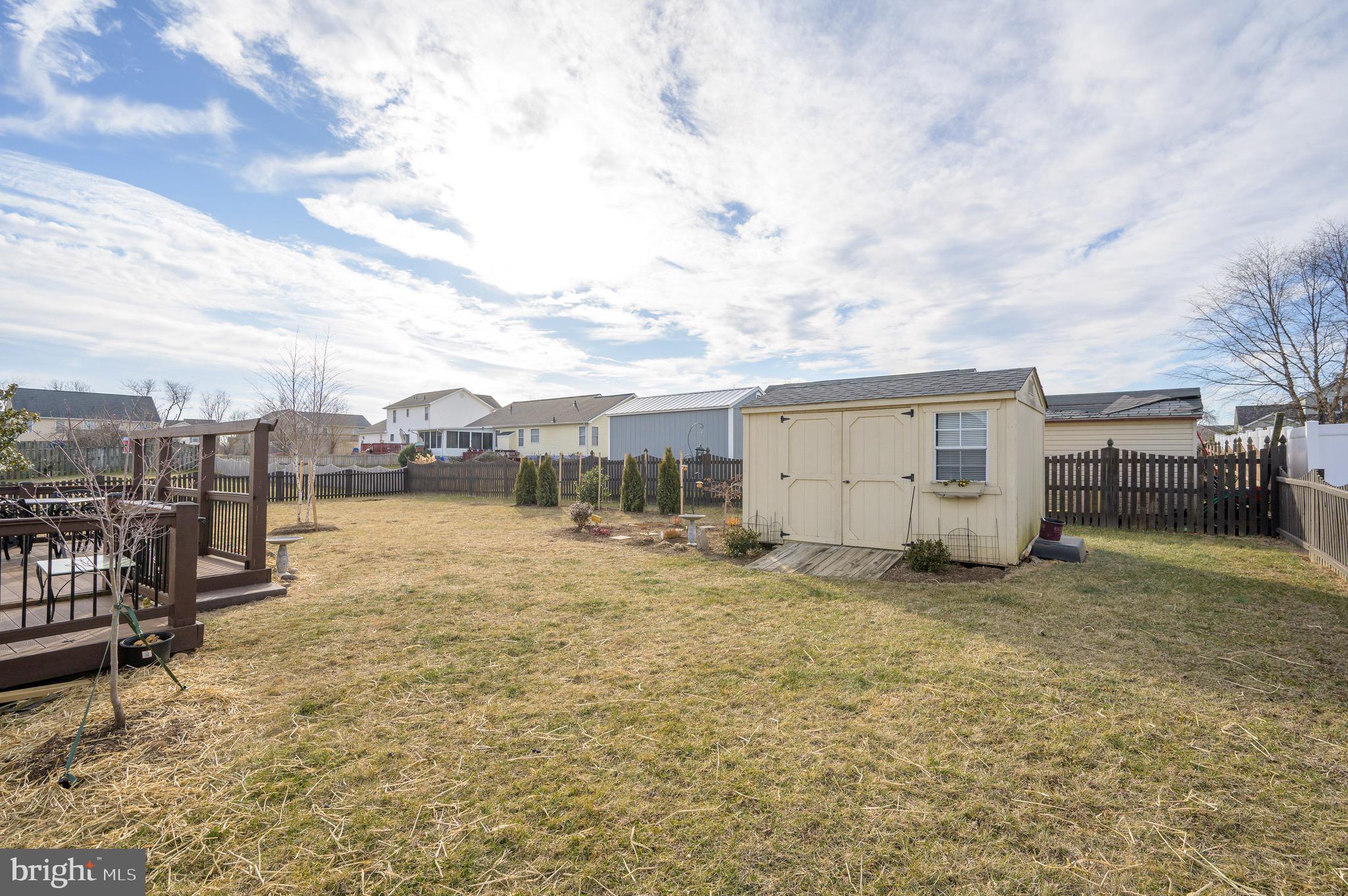 73 McGregor Drive Ranson, WV 25438 - Photo 54 of 68 a view of a house with backyard and sitting area