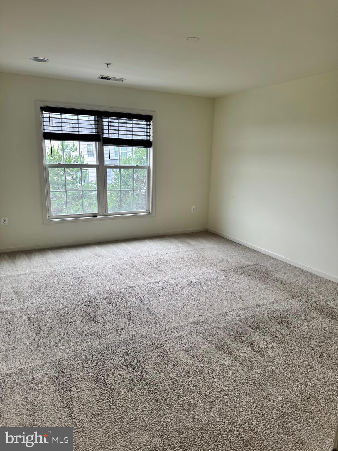 1608 Poplar Run Drive Silver Spring, MD 20906 - Photo 11 of 18 an empty room with a fireplace