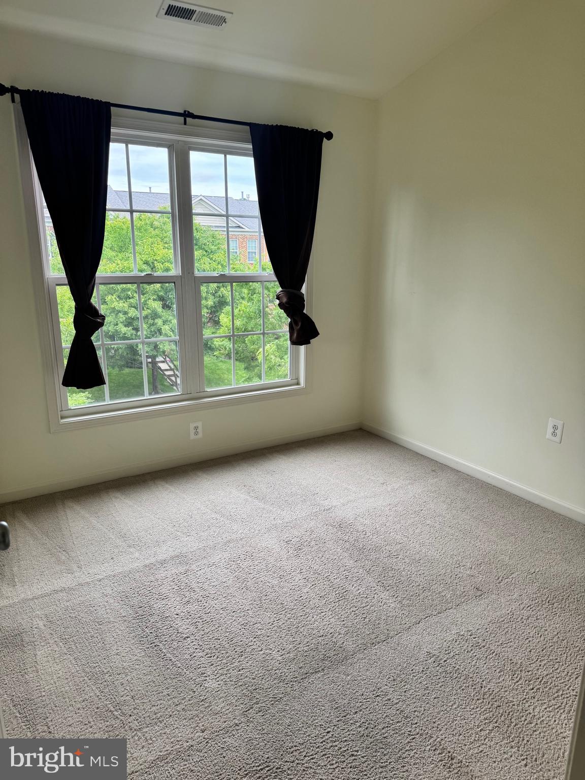 1608 Poplar Run Drive Silver Spring, MD 20906 - Photo 4 of 18 an empty room with a window