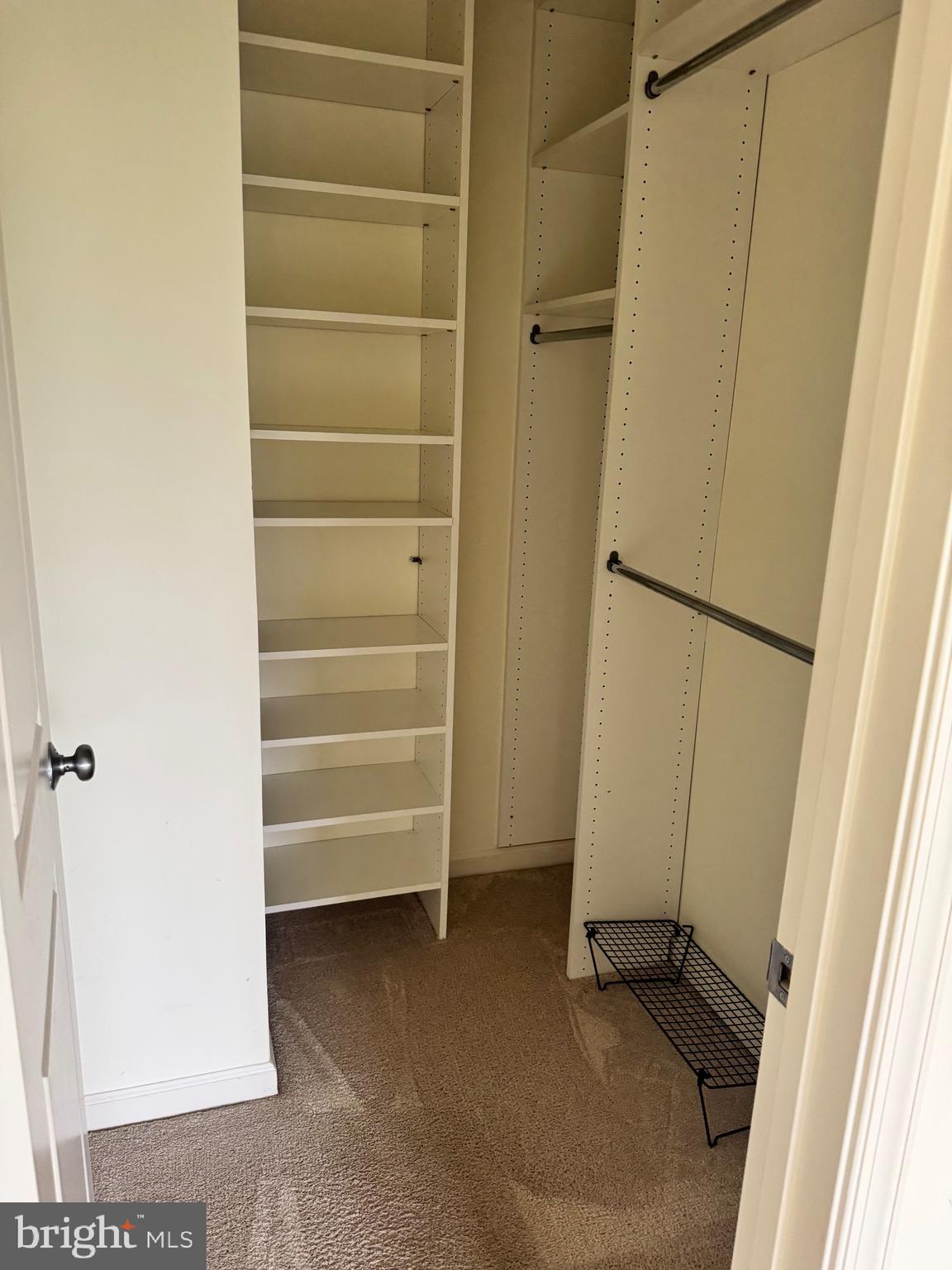 1608 Poplar Run Drive Silver Spring, MD 20906 - Photo 6 of 18 a view of walk in closet with empty racks