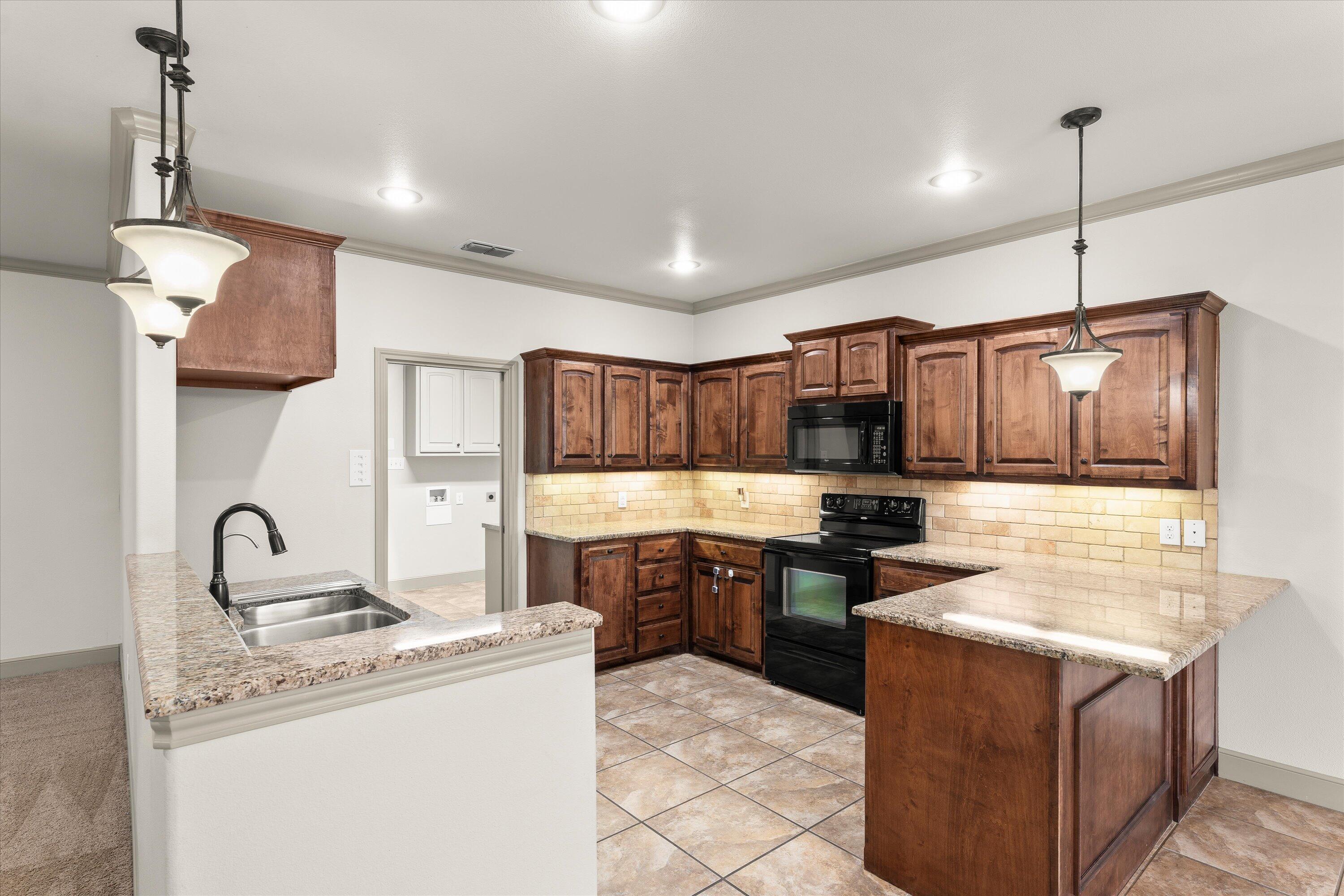 6209 101st Place Lubbock, TX 79424 - Photo 9 of 31 09-6209 101st St