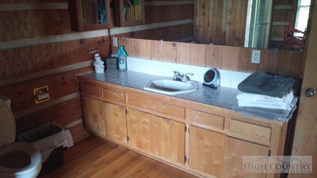 1918 Replogle Drive Boone, NC 28607 - Photo 12 of 39 a kitchen with sink and mirror