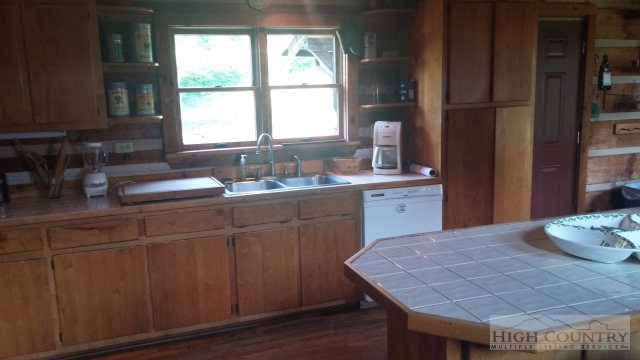 1918 Replogle Drive Boone, NC 28607 - Photo 17 of 39 a kitchen with a sink cabinets and window