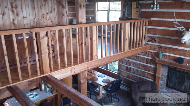 1918 Replogle Drive Boone, NC 28607 - Photo 8 of 39 a view of staircase with wooden floor and a window