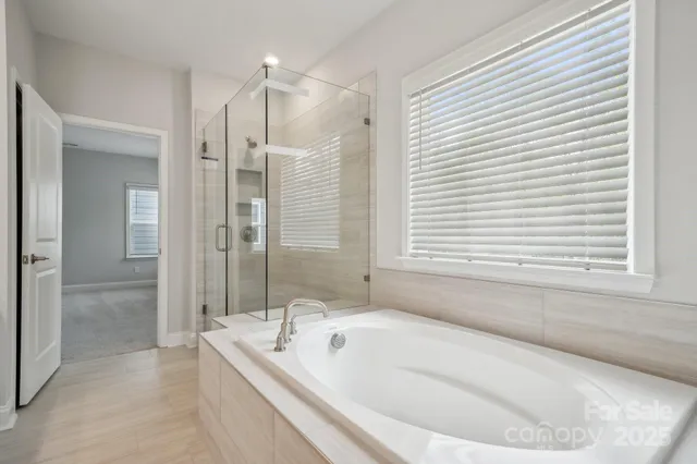 a kitchen with a stove and a white cabinets