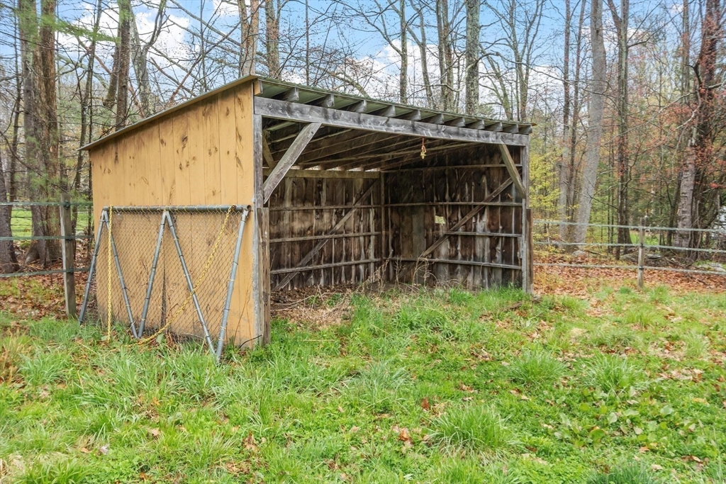 340 Ball Hill Road Princeton, MA 01541 - Photo 12 of 41 a view of backyard with wooden fence