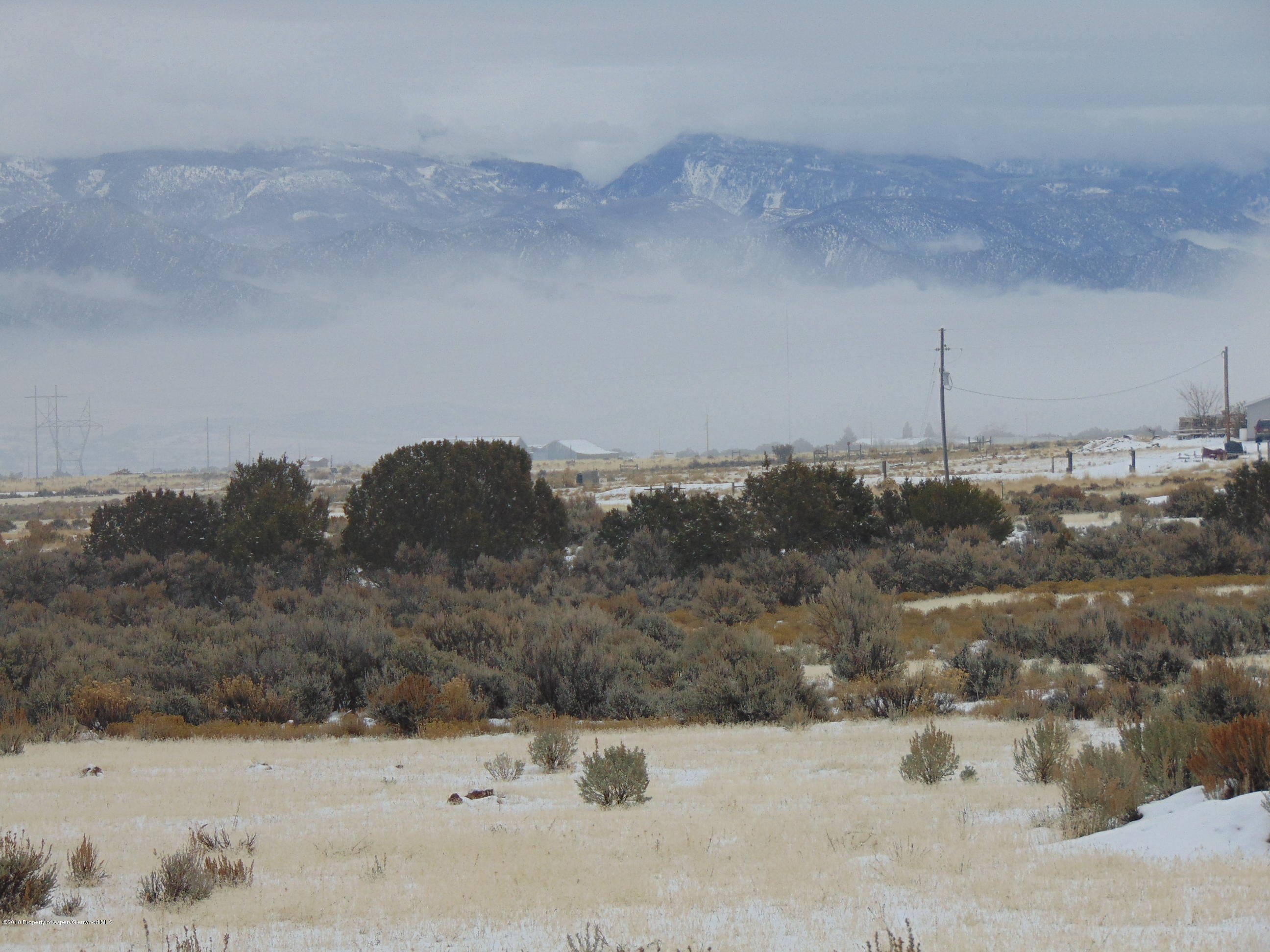 Tbd Tbd Quicksilver Court Rifle, CO 81650 - Photo 18 of 19 a view of a dry yard covered with snow in the background