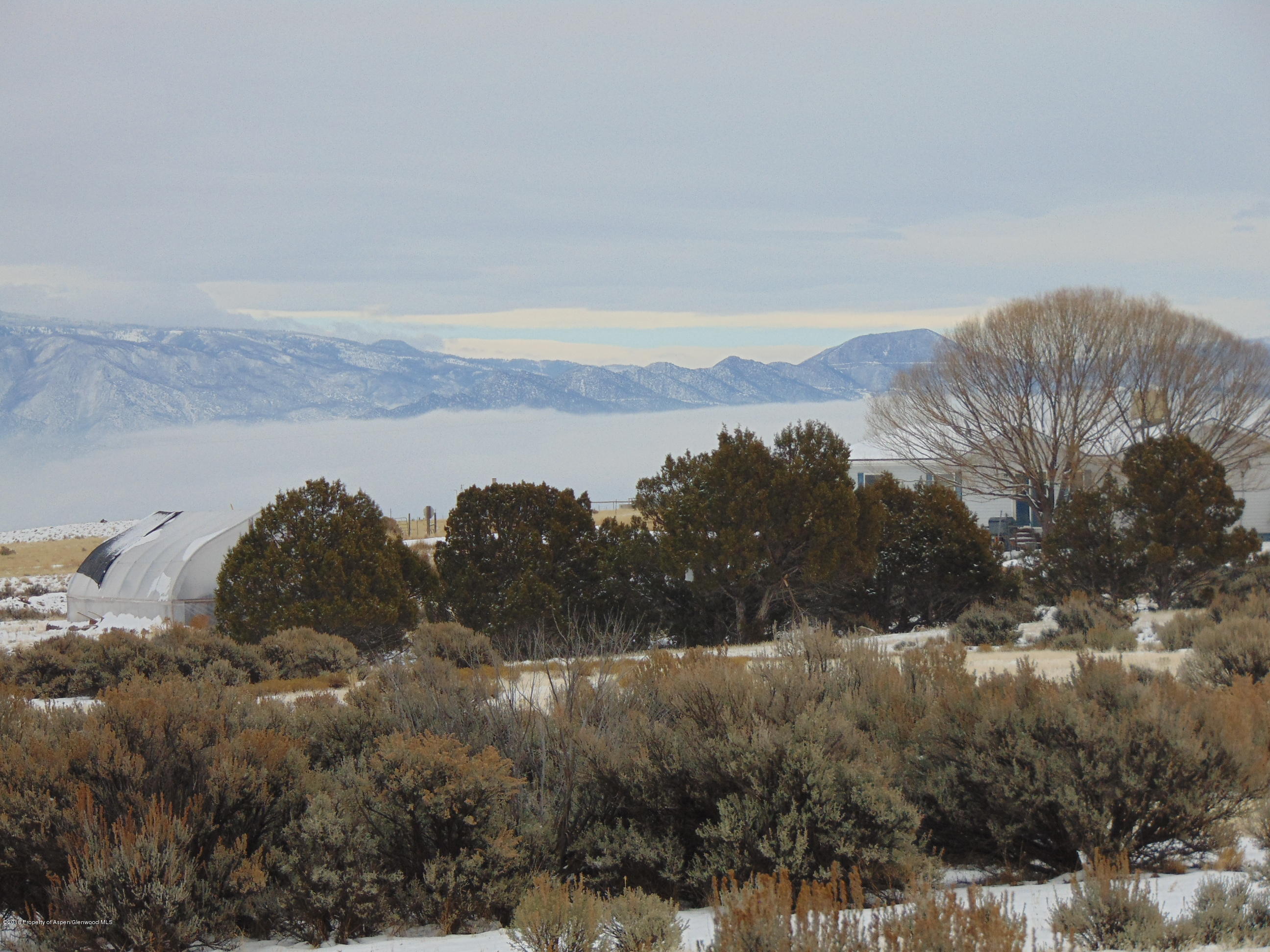 Tbd Tbd Quicksilver Court Rifle, CO 81650 - Photo 4 of 19 a view of a lake in middle of a field