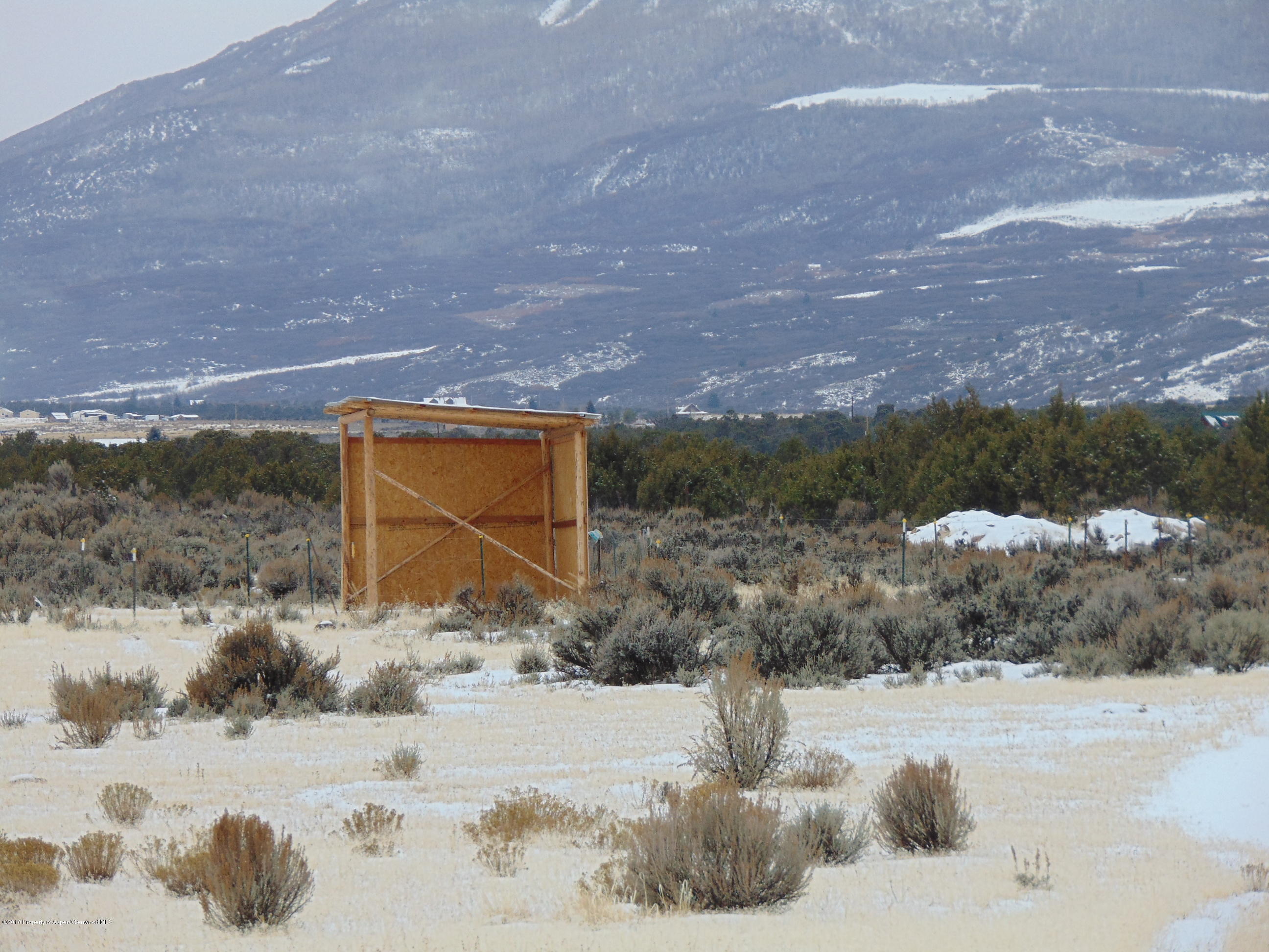 Tbd Tbd Quicksilver Court Rifle, CO 81650 - Photo 6 of 19 a front view of a house with a yard covered in snow