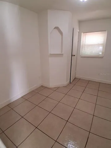 a bathroom with a toilet a sink and shower