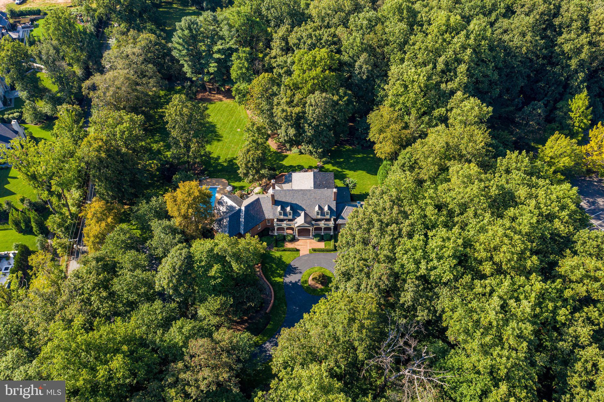 1008 Pine Hill Road McLean, VA 22101 - Photo 2 of 29 an aerial view of a house with a yard