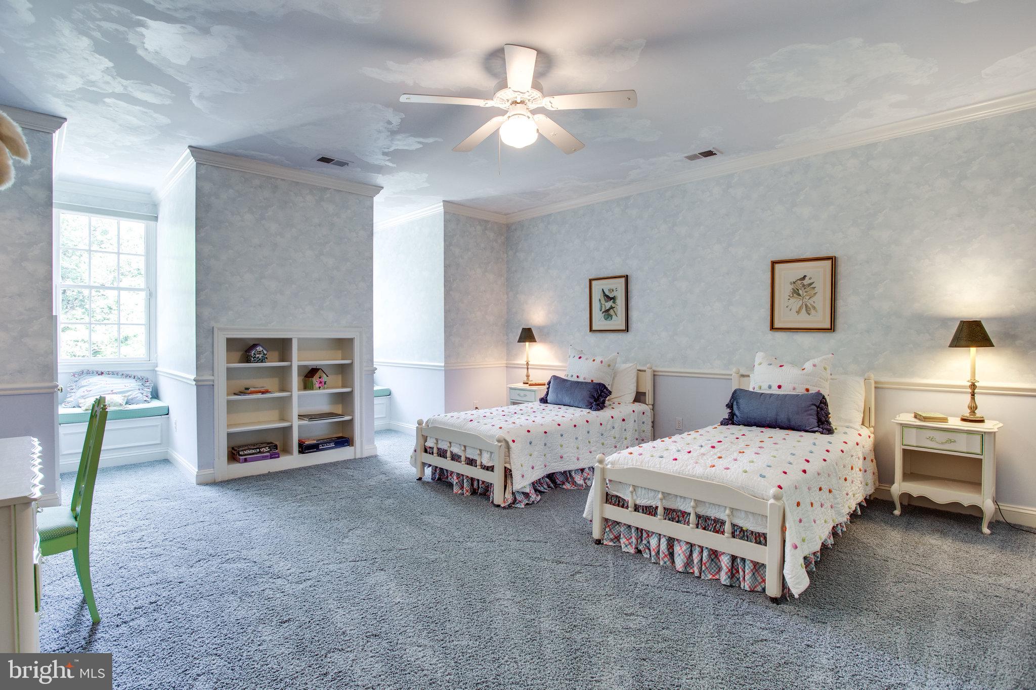 1008 Pine Hill Road McLean, VA 22101 - Photo 16 of 29 a bedroom with bed and a chandelier