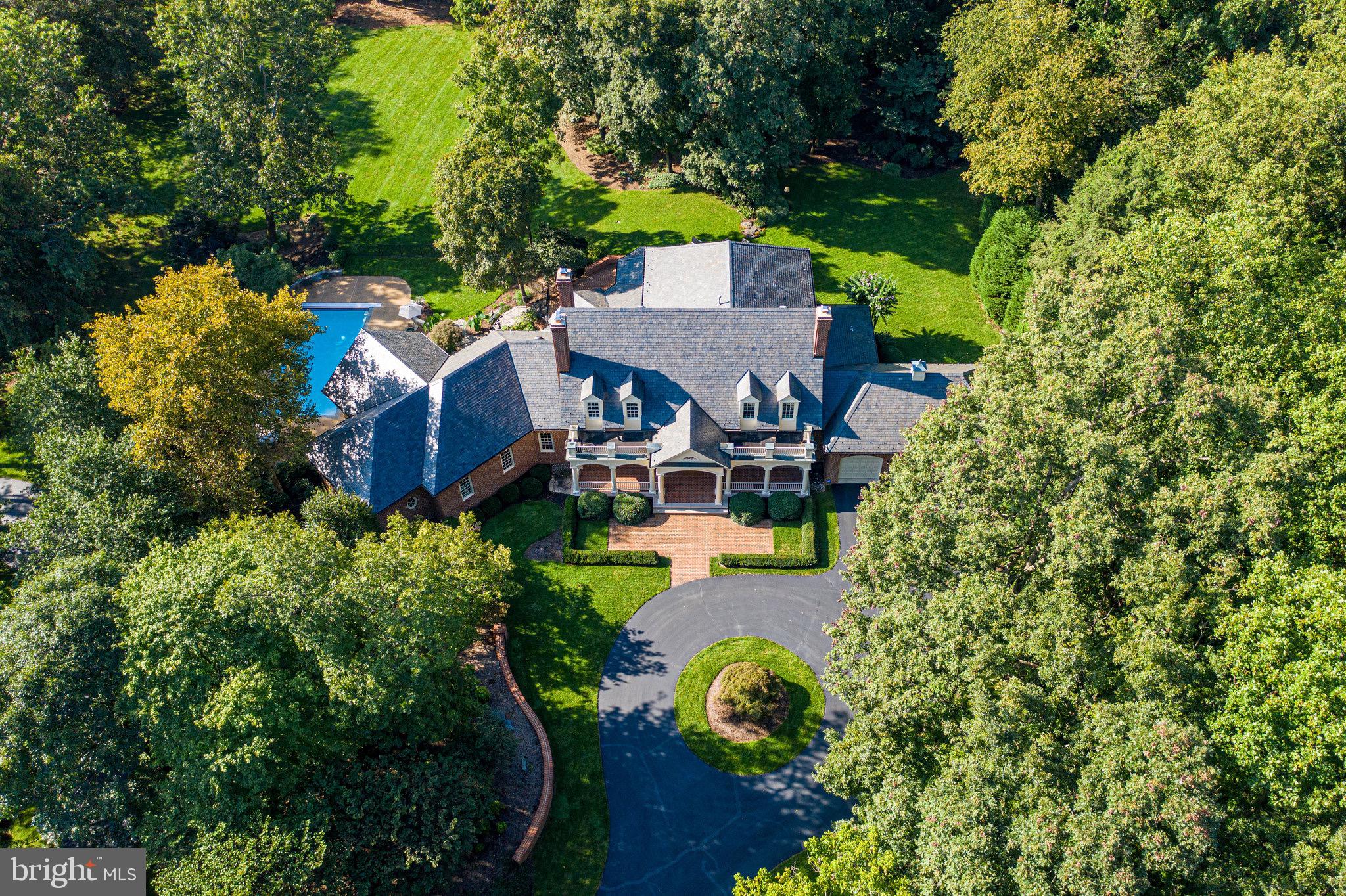1008 Pine Hill Road McLean, VA 22101 - Photo 3 of 29 an aerial view of a house with a garden
