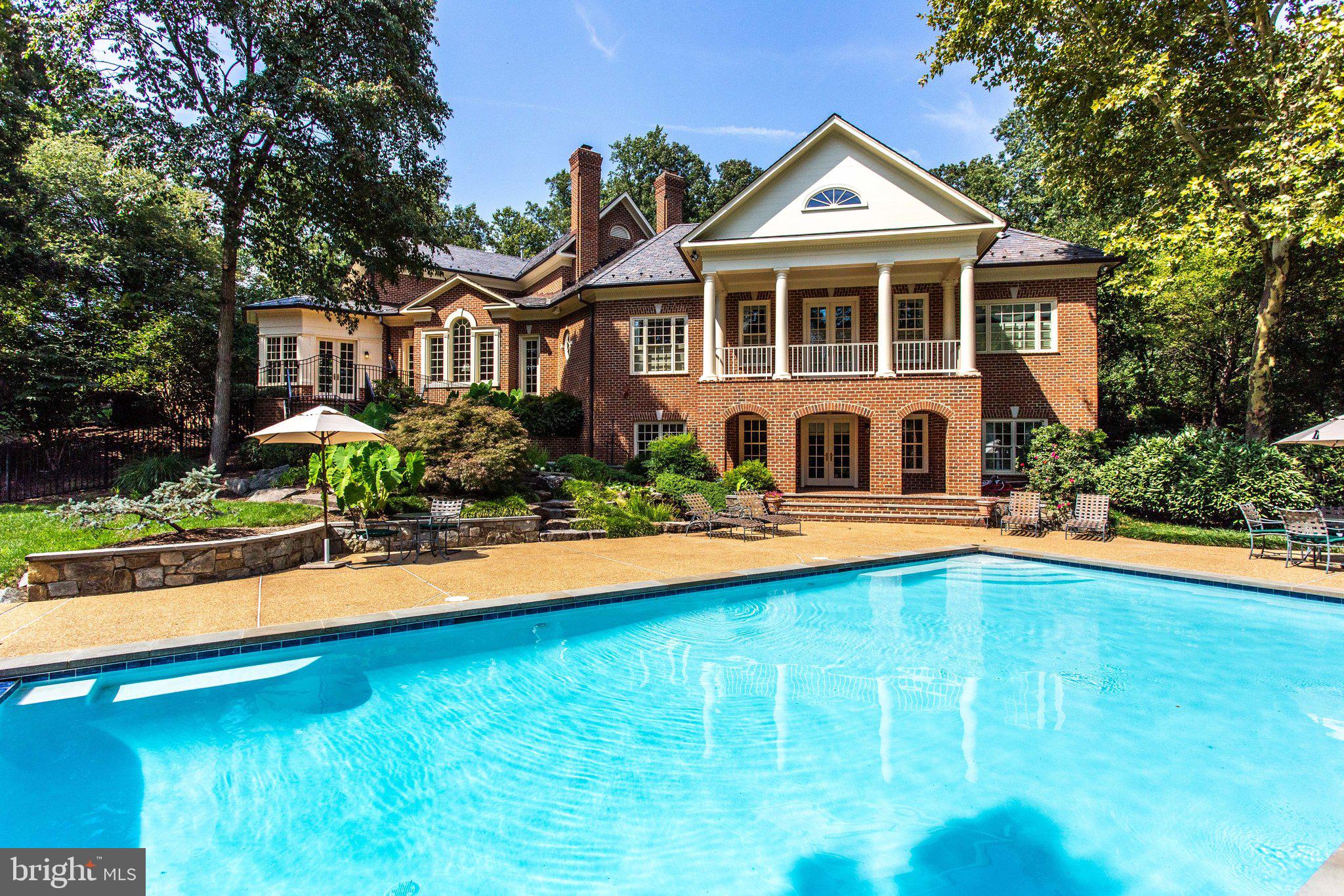 1008 Pine Hill Road McLean, VA 22101 - Photo 22 of 29 a front view of a house with swimming pool
