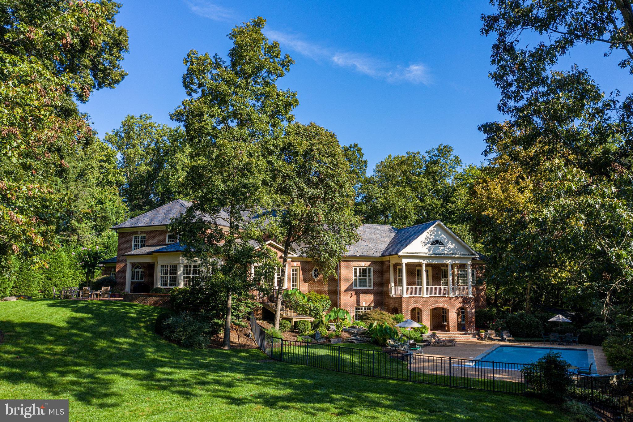 1008 Pine Hill Road McLean, VA 22101 - Photo 23 of 29 a front view of a house with a yard