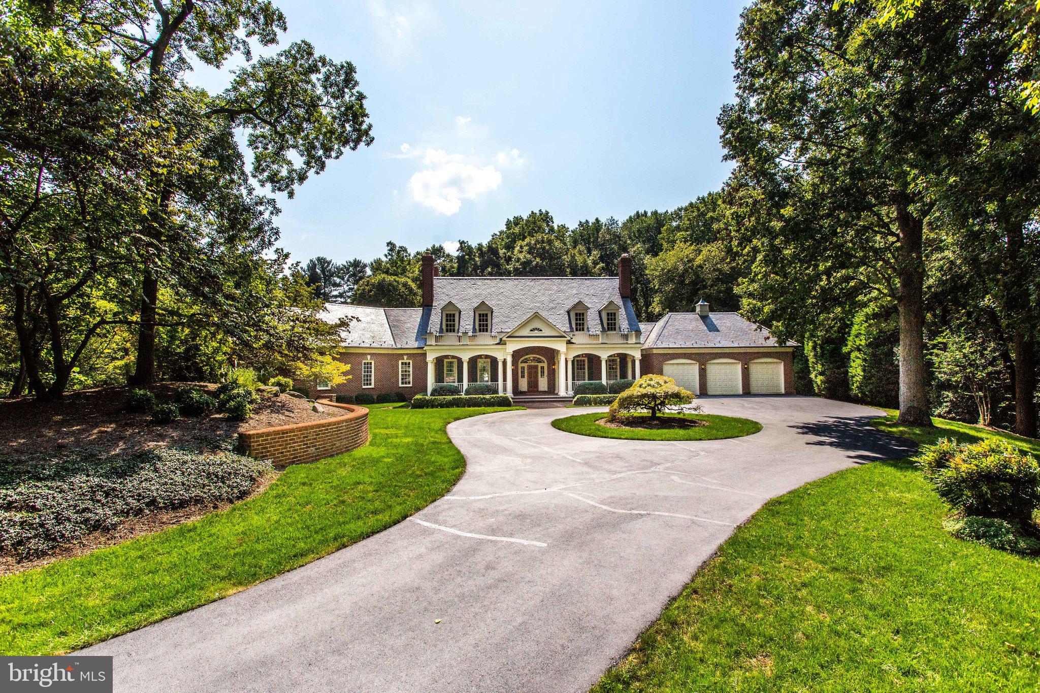 1008 Pine Hill Road McLean, VA 22101 - Photo 4 of 29 a front view of a house with garden