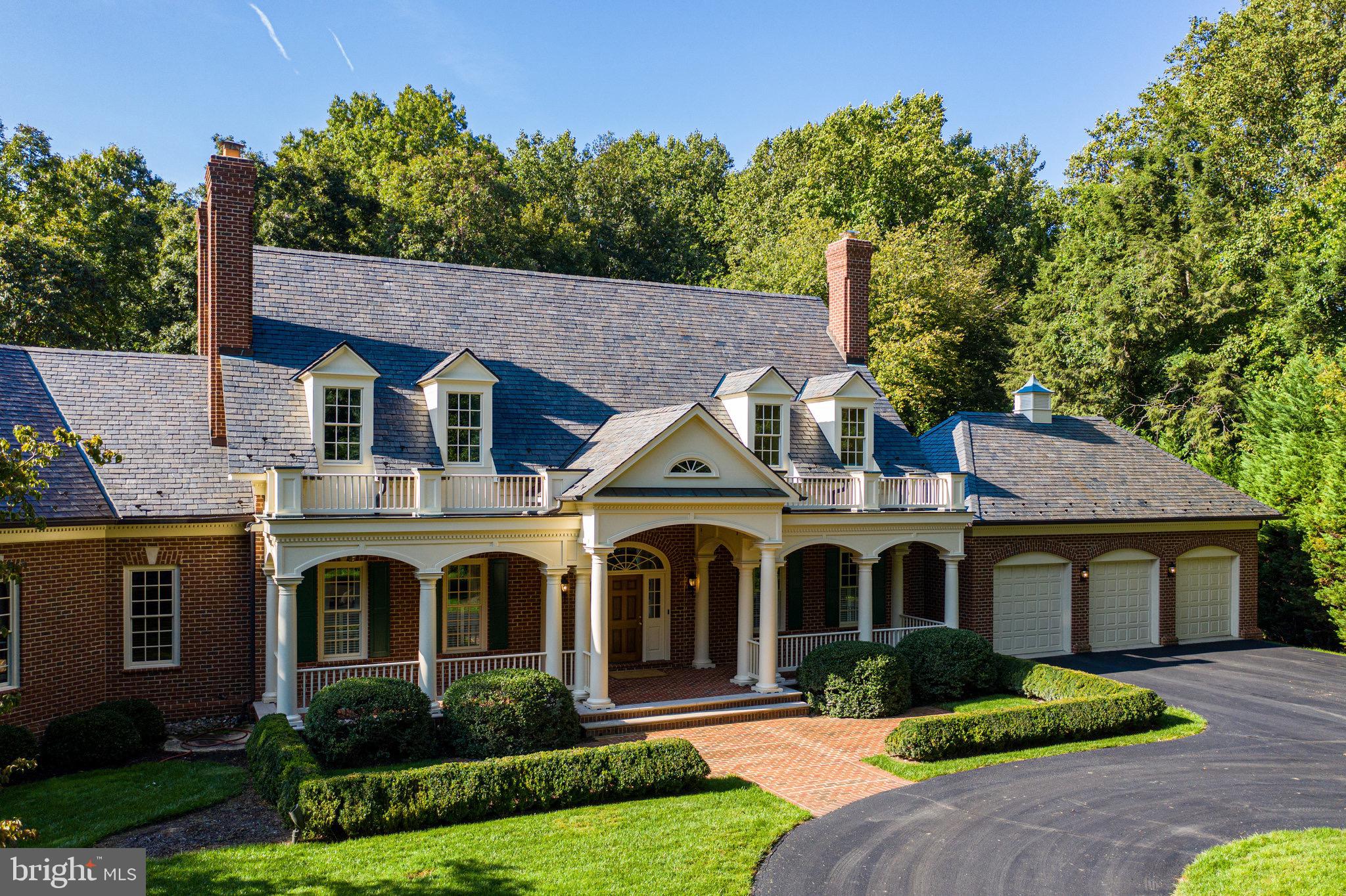 1008 Pine Hill Road McLean, VA 22101 - Photo 5 of 29 a front view of a house with garden