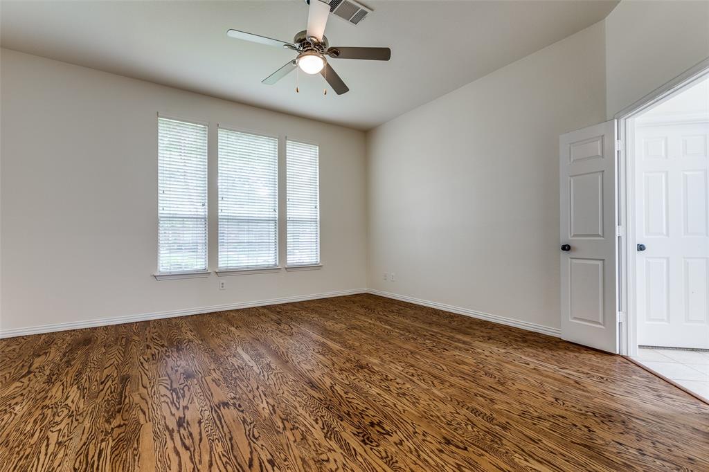 3313 Shady Valley Road Plano, TX 75025 - Photo 12 of 34 a view of an empty room with a window
