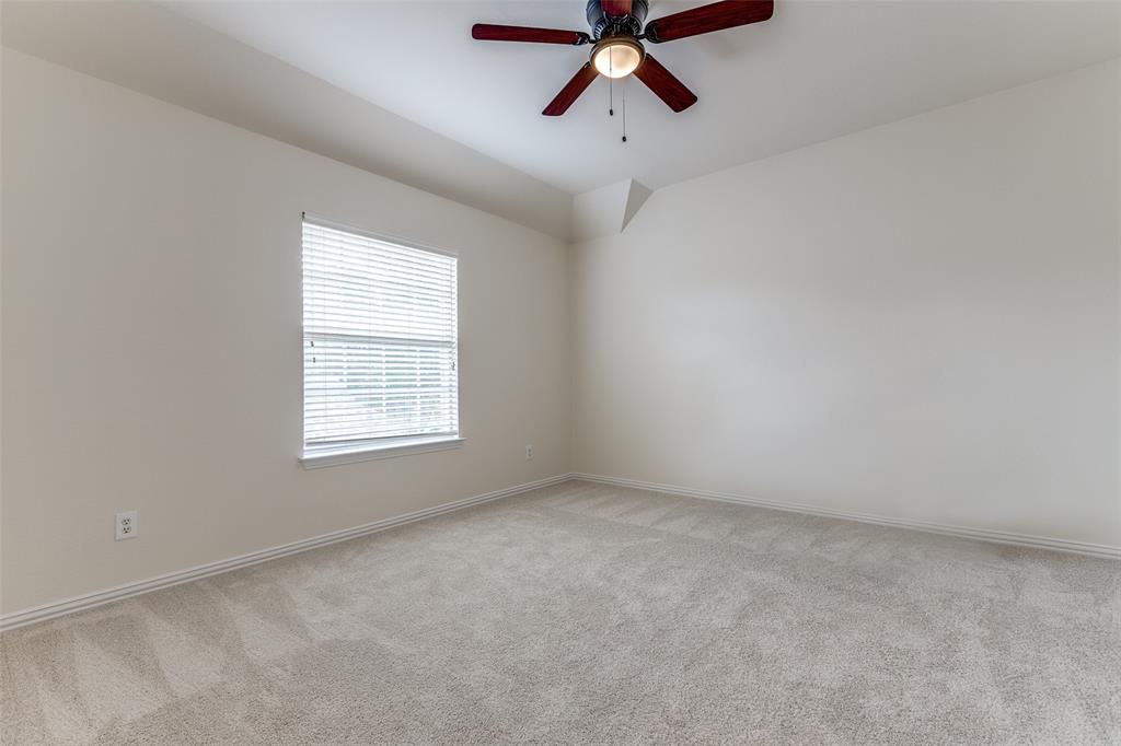 3313 Shady Valley Road Plano, TX 75025 - Photo 22 of 34 an empty room with a window