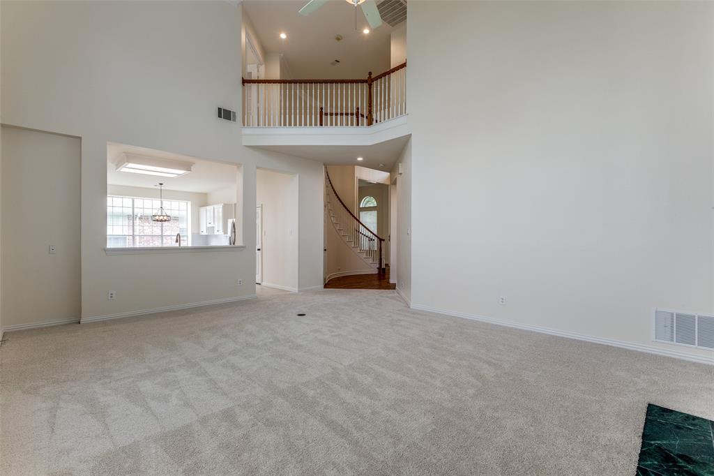3313 Shady Valley Road Plano, TX 75025 - Photo 8 of 34 a view of an empty room with a window