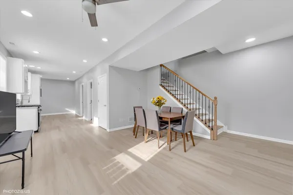 a view of a hallway with seating area