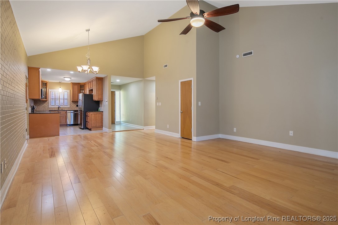 2118 Winterlochen Road Fayetteville, NC 28305 - Photo 24 of 50 wooden floor in an empty room with a window