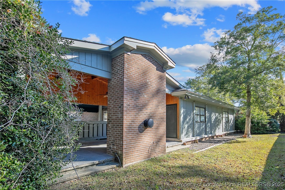 2118 Winterlochen Road Fayetteville, NC 28305 - Photo 48 of 50 a front view of a house with a yard