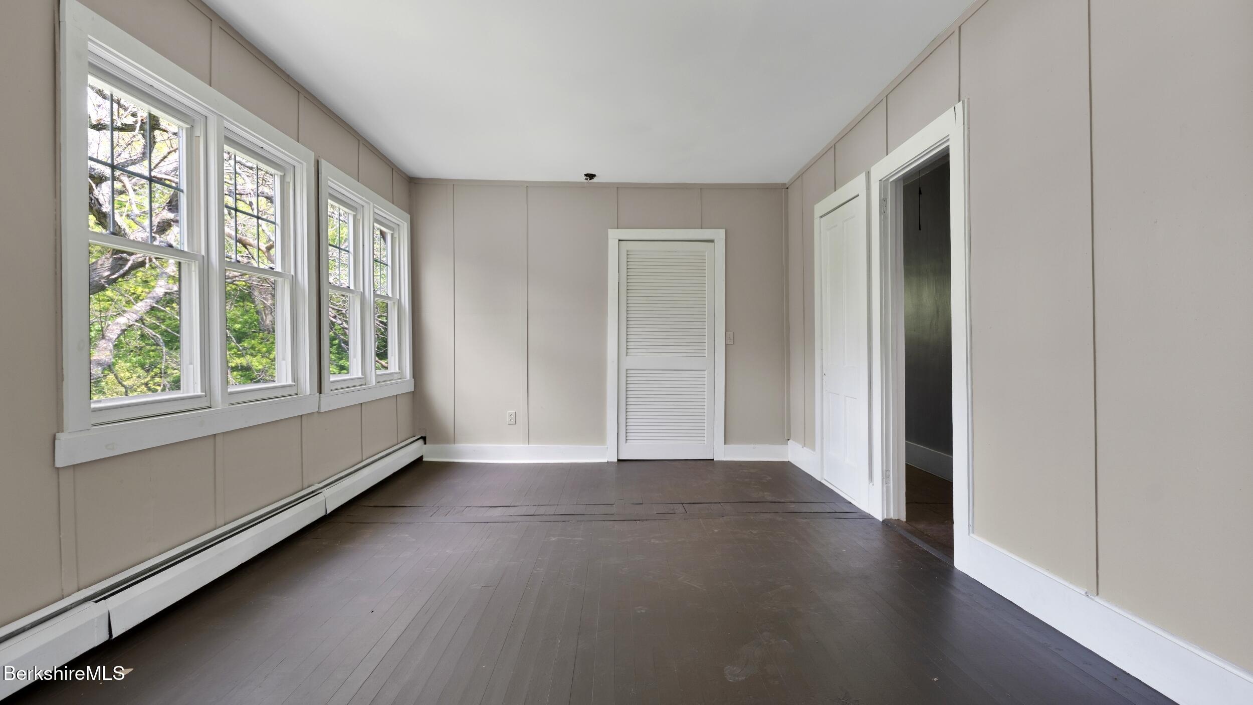 20 East Dugway Road Lenox, MA 01240 - Photo 44 of 84 a view of an empty room with glass door and balcony