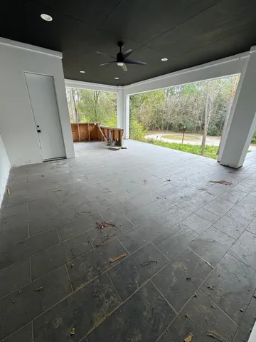 a bathroom with a double vanity sink toilet mirror and bathtub