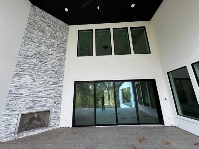 a spacious bathroom with a sink toilet and shower