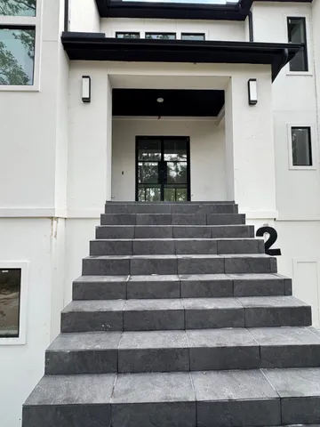 a view of a livingroom with a flat screen tv