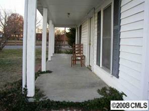 2134 Triplett Road Mount Ulla, NC 28125 - Photo 3 of 8 a view of a house with a yard
