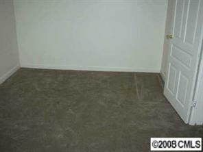 2134 Triplett Road Mount Ulla, NC 28125 - Photo 7 of 8 a view of an empty room