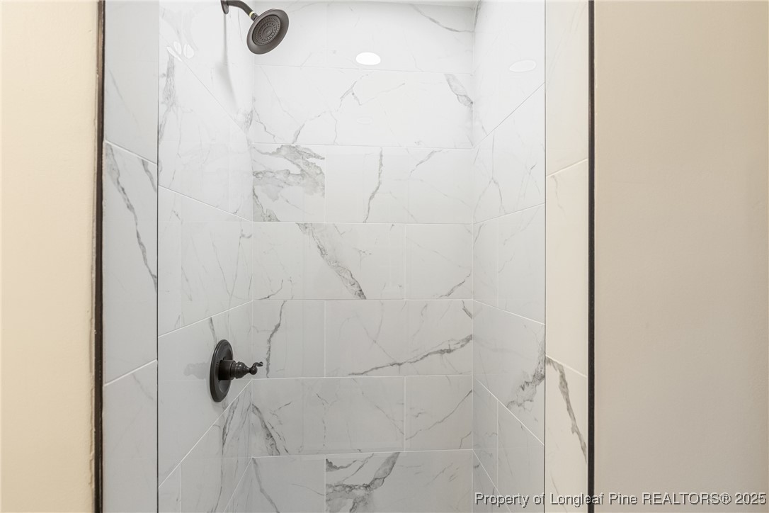 321 Summerhill Road Fayetteville, NC 28303 - Photo 20 of 26 a bathroom with a shower