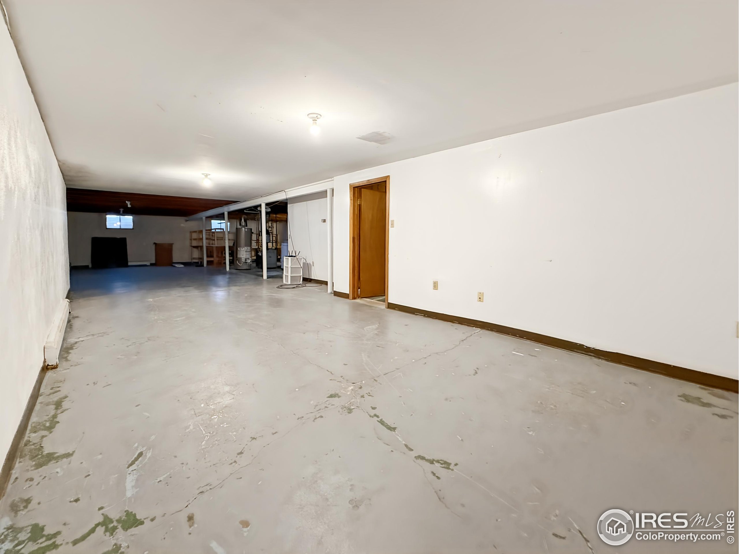 1695 6th Street Limon, CO 80828 - Photo 20 of 32 an empty room with ceiling fan